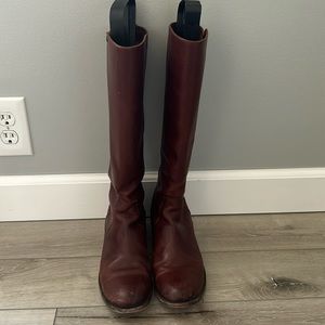 Women’s FRYE knee high leather zip up boot.